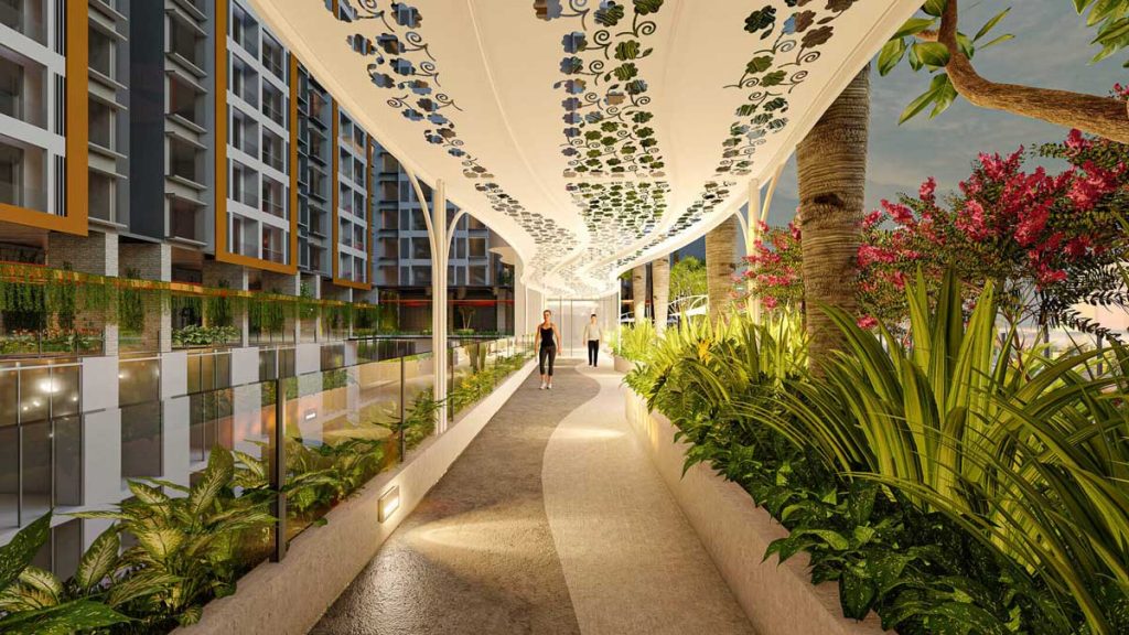 Đường dạo bộ có mái che với mảng xanh dọc lối đi tại Urban Green